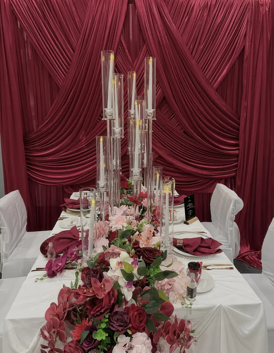 Burgundy backdrop reception table