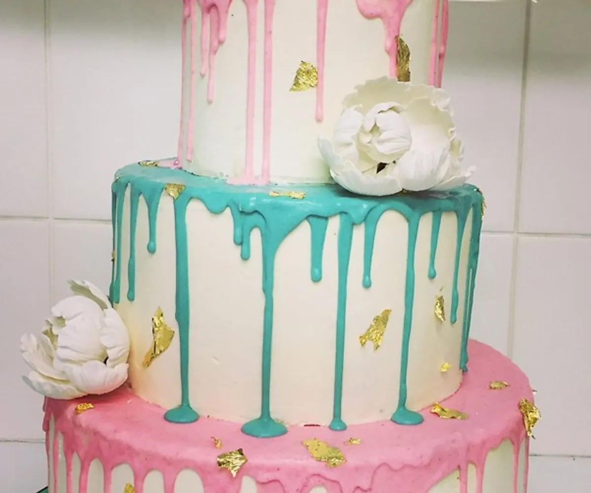Blue and teal cake for baby shower
