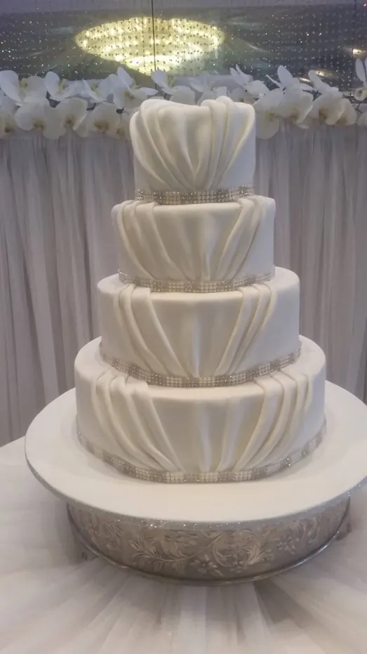 Elegant 4 Tier Cake for white draped cake
