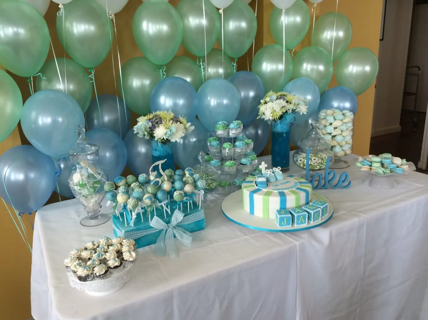 Blue And Green Christening Cake for Cross and booties christening cake