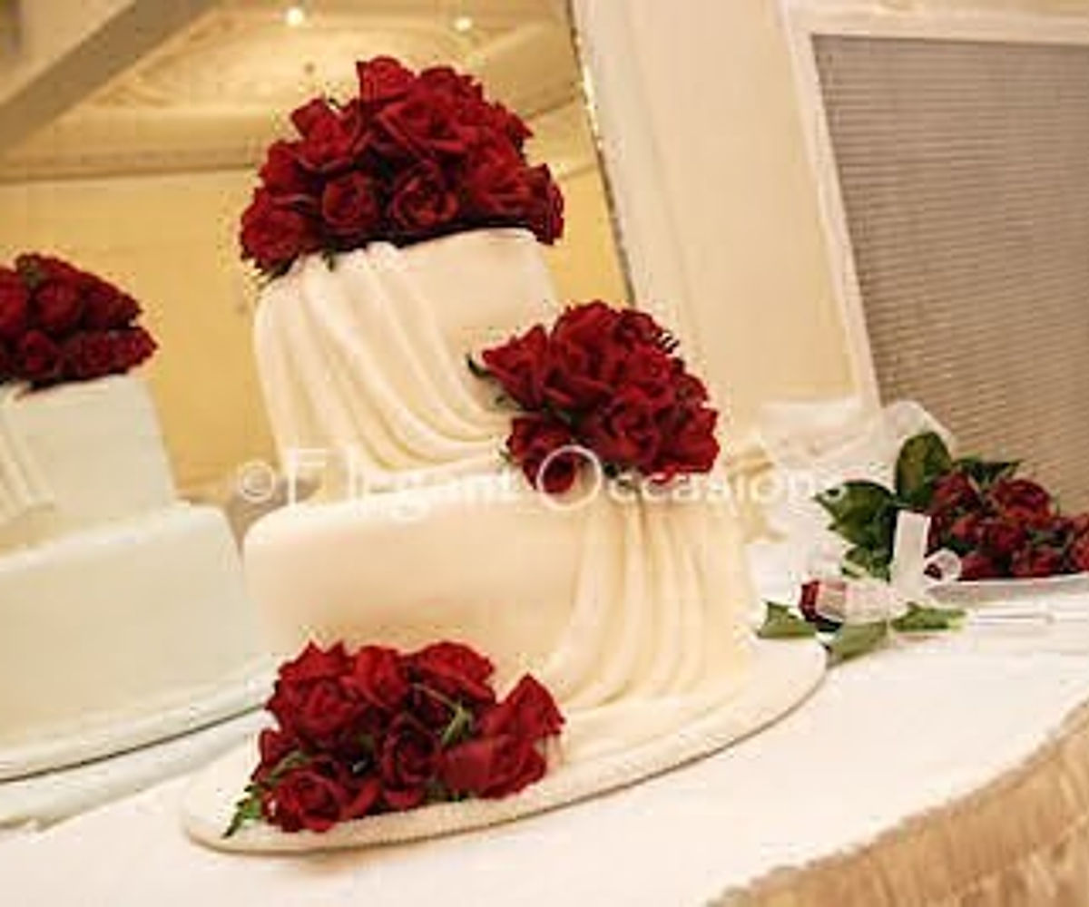 roses and drapes wedding cake