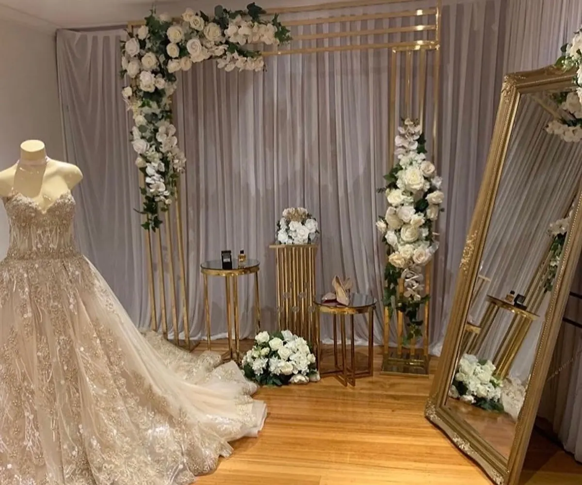 gold arch and florals