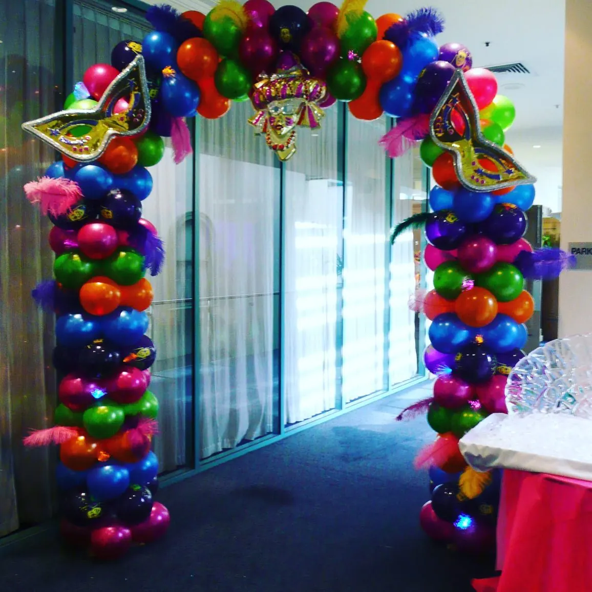 Colourful Balloon Arch for Masquerade entrance arch