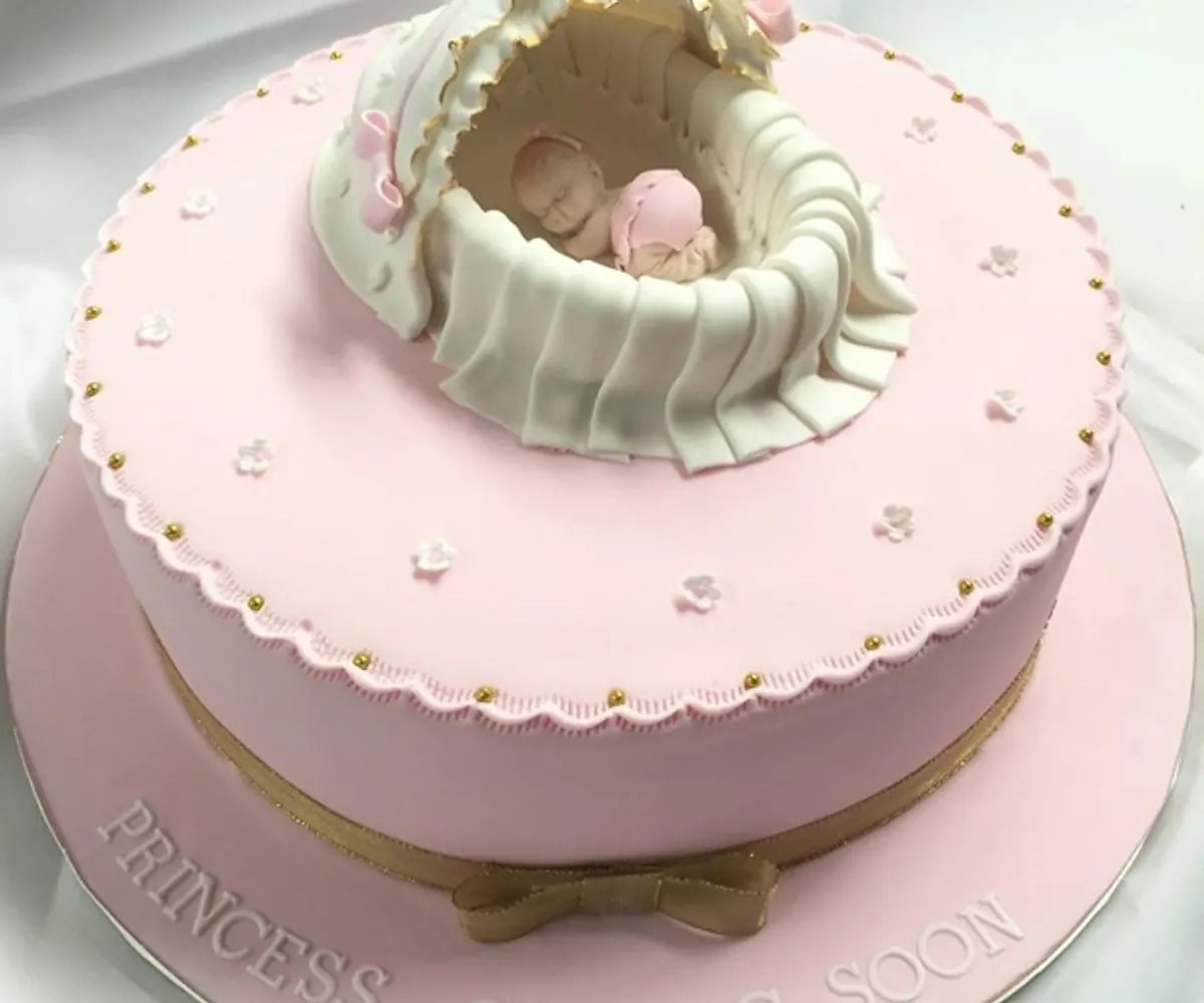 Cradle and baby christening cake