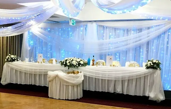 White Backdrop With Lights for Organza draping and lights