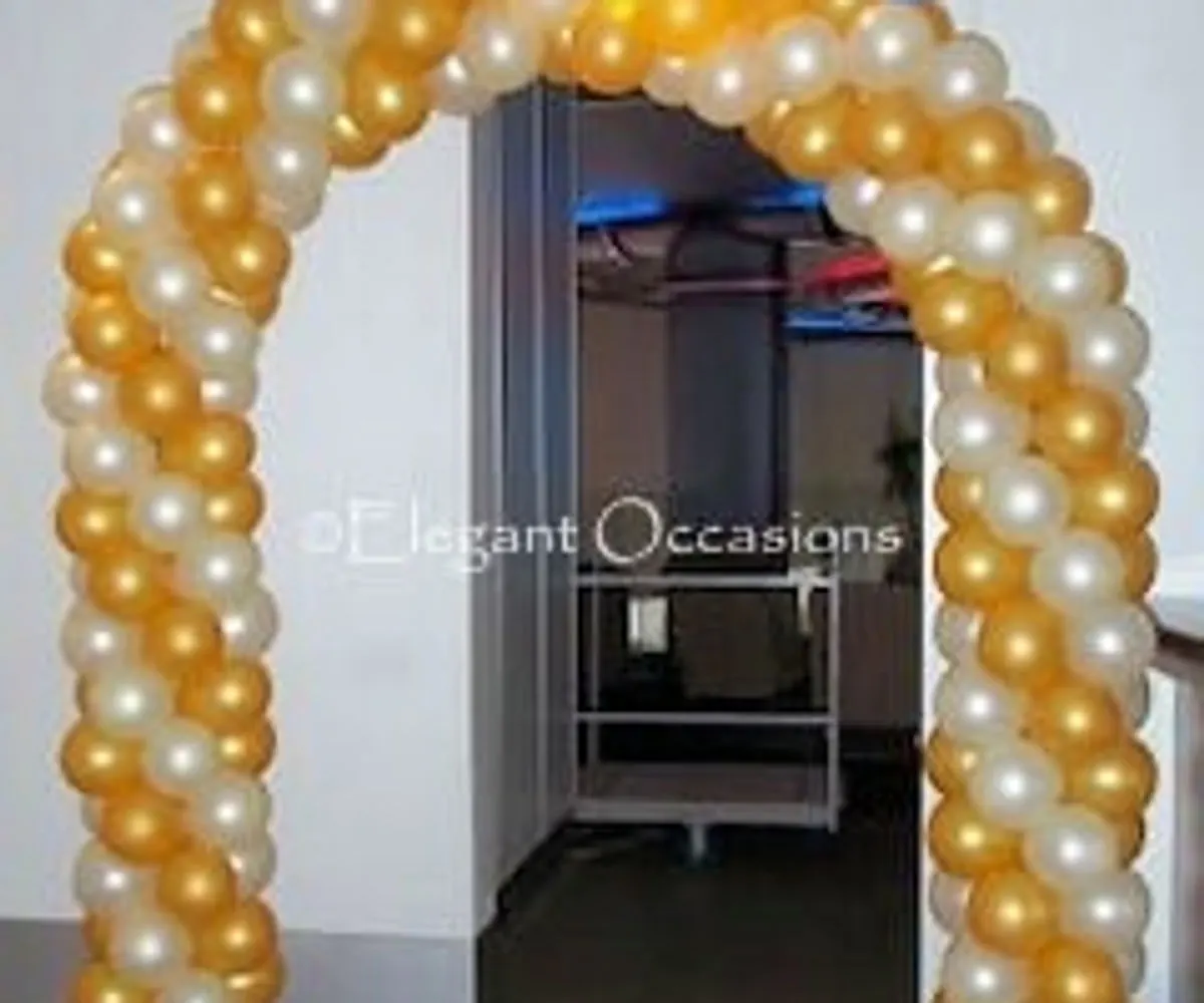 gold and white balloon arch